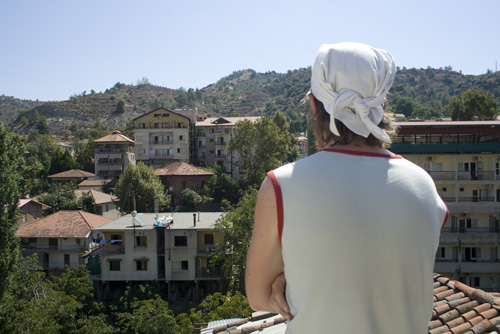 kikker Me looking at the view in the town Kakopetria (Cyprus)