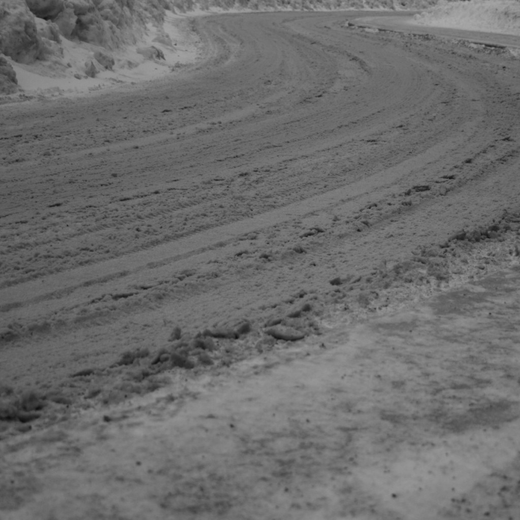 Snowy road with S lines